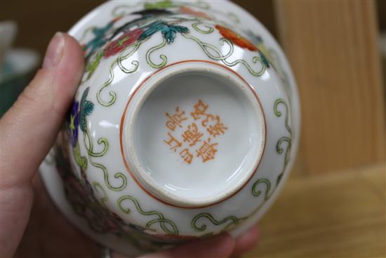Five Chinese porcelain rice bowls, covers and stands, together with two spoons, second half 20th century, bowls 10.5cm diameter